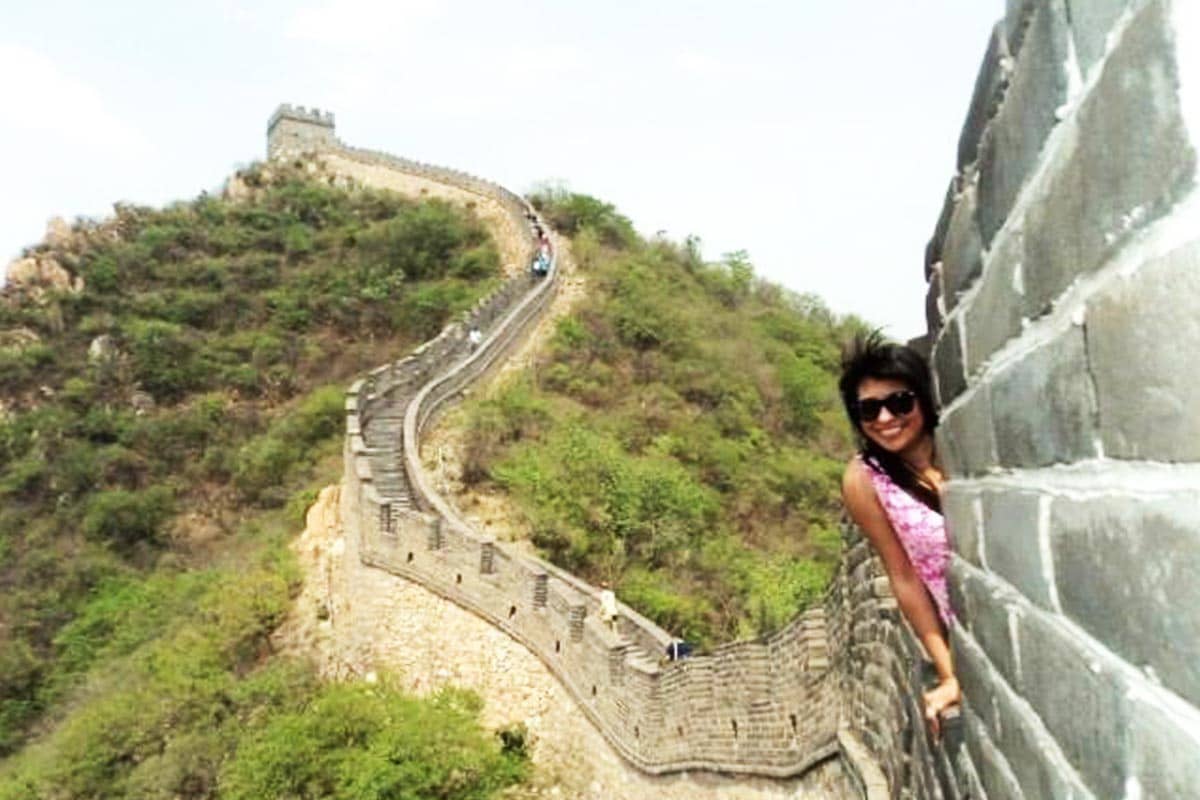 Salma Gomez '16 visits the Great Wall of China on one of her five study abroad excursions while a business management student at UTSA.