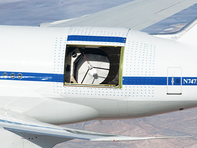 NASA’s Stratospheric Observatory for Infrared Astronomy telescope, scanning from inside a Boeing 747 jumbo jet.