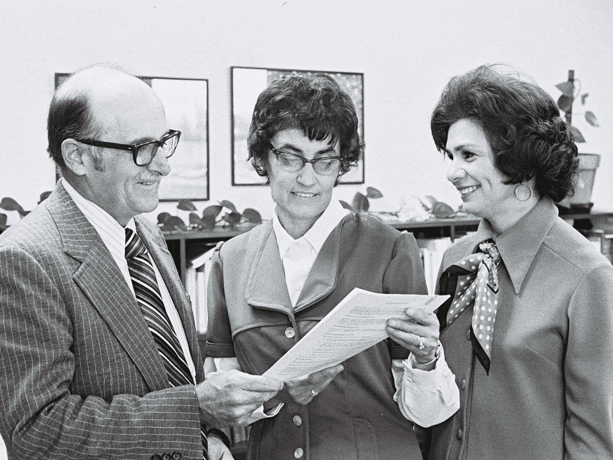 Continuing to honor UTSA’s firsts, President Flawn gives an acceptance letter to junior Margaret Aguilar, the first undergraduate to enroll, on January 28, 1975.