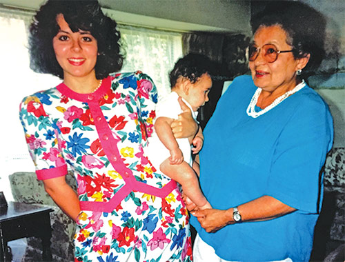 Dr. Margo DelliCarpini (left) and her grandmother, Celina ‘Nina’ Cruz-Roces (right), in 1991 with Margo’s middle child, daughter Becky DelliCarpini.