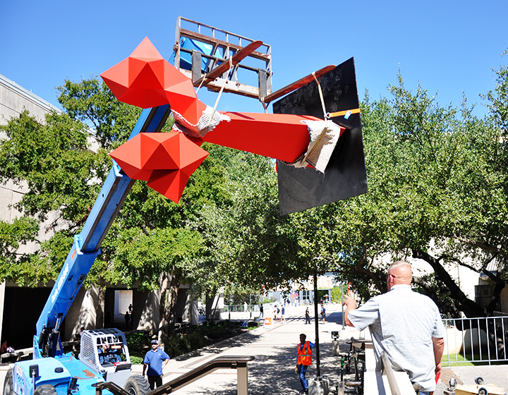 A Sebastian sculpture is transported to Sombrilla Plaza