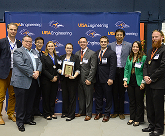 
CITE director Cory Hallam and biomedical engineering assistant professor Teja Guda with Chiron, the student-led team that took first place.
