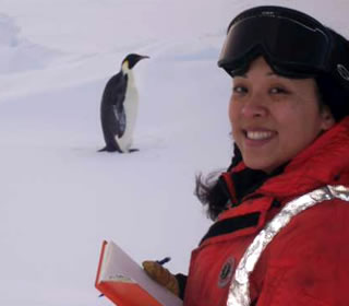 researcher and penguin