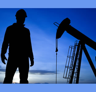man at oil well