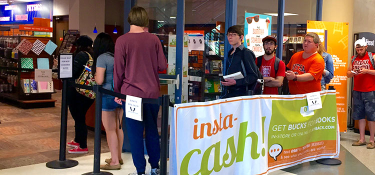 UTSA students line up to return books from whence they came
