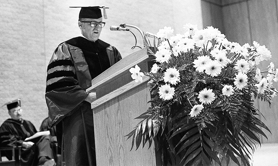 President Peter Flawn addresses graduating students and their guests at the beginning of the ceremonies.