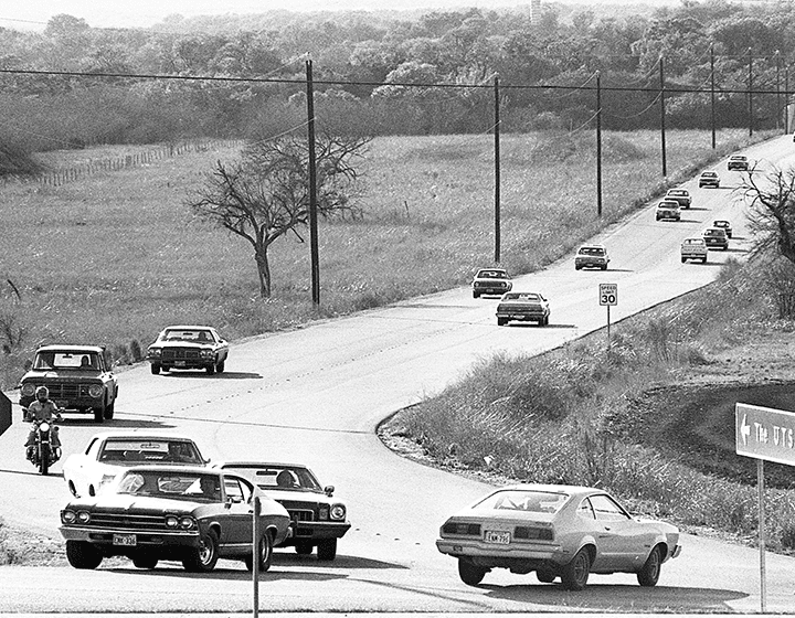 Traffic on UTSA Boulevard, the main artery to campus, on February 18, 1976.