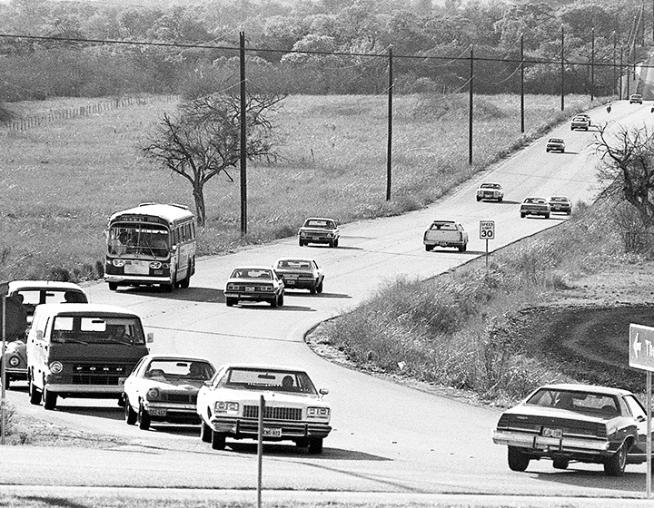 Traffic on UTSA Boulevard, the main artery to campus, on February 18, 1976.