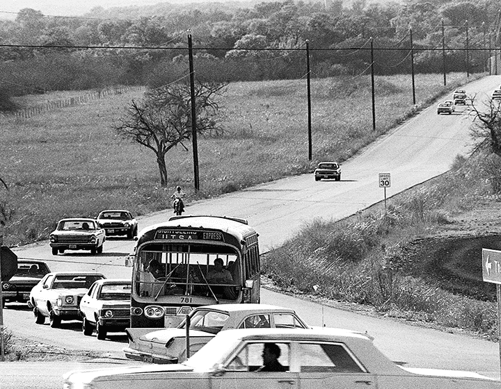 Traffic on UTSA Boulevard, the main artery to campus, on February 18, 1976.