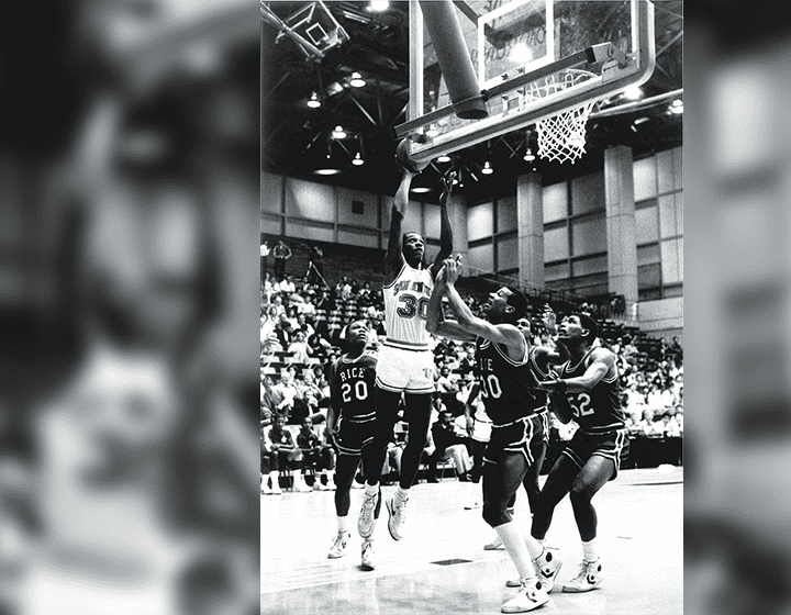 Gervin shoots a scoring hoop in a game against Rice on December 10, 1984, in his junior year. An All-America candidate that season, he was the nation’s ninth leading scorer.