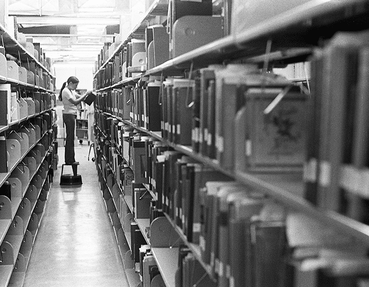 Making progress getting the books onto shelves.