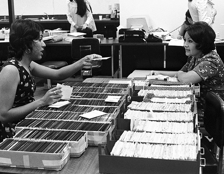 Library workers prepare the cards for the 300,000 volumes that will go into the card catalog.