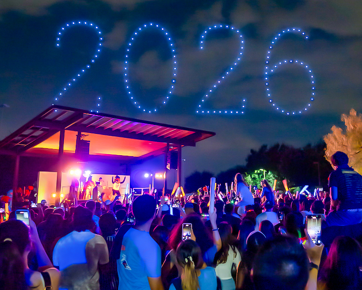 UTSA event with a drone show displaying "2026" in the sky.