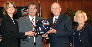 Lynn Hickey, President Romo, Larry Coker and his wife