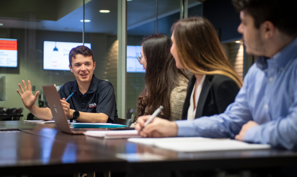 Students chatting around a table