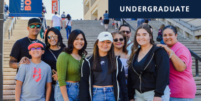Family posing for photo at the UTSA campus