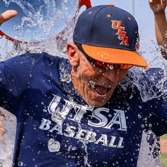 Coach getting water dumped on him