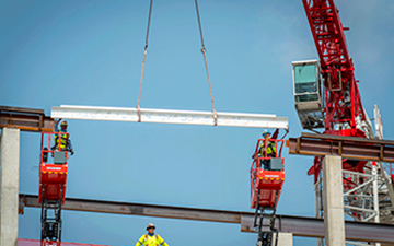 Beam being moved by a crane