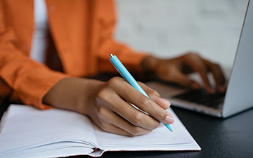 Female writing notes