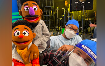 Bradley Freeman Jr. on set with his new Muppet