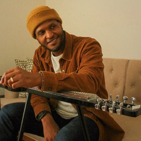 Aaron Stephens sliming with guitar