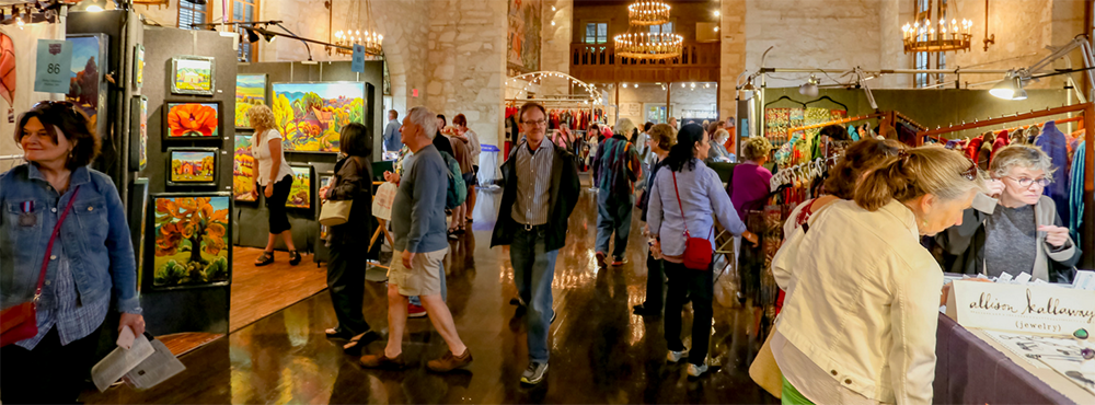 People browsing art booths at Fiesta Arts Fair