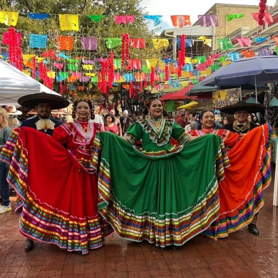 Grupo Folklorico de Bendiciones posing at market square in San Antonio
