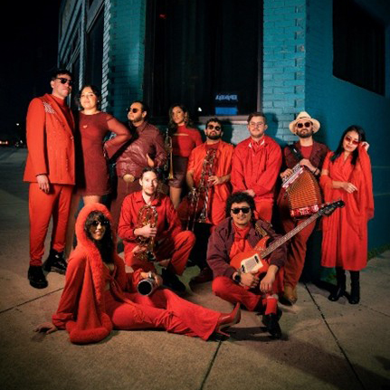 Volcan posing with instruments