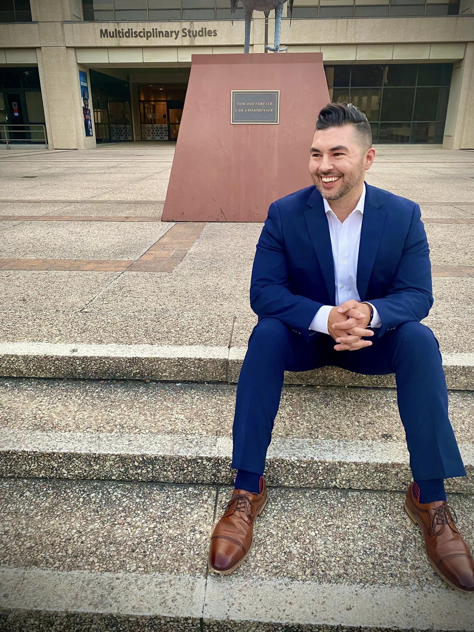 Jacob Cavazos on steps smiling