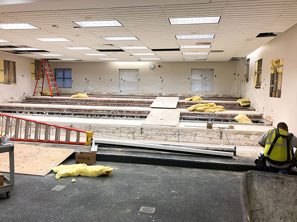 Facilities team prepares classroom 2.01.14 in the Business Building for upcoming upgrades.