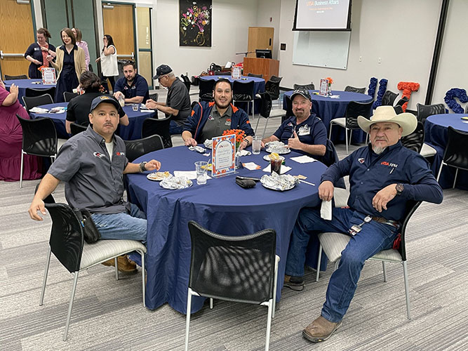 Employee Appreciation 2025 photo 2 - Facilities team sitting at table