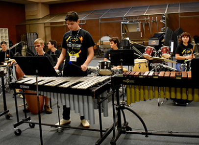 Student playing an instrument at the percussion summer camp