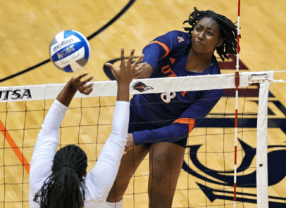 Volleyball player spiking the ball.