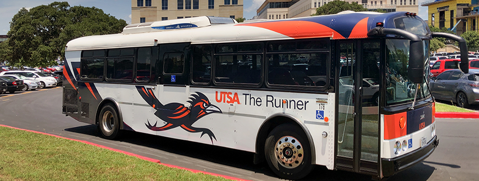 Students board a VIA shuttle from the UTSA Main Campus.