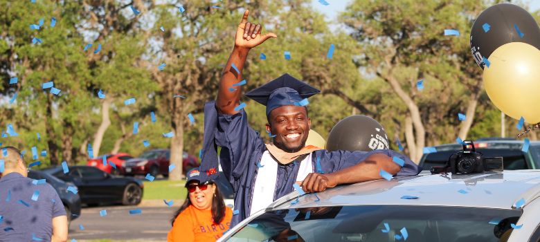 Commencement Drive Graduate Celebrates