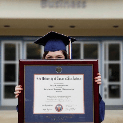 Grad with diploma frame