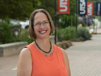 Abigail Rhodes posing for photo on UTSA campus