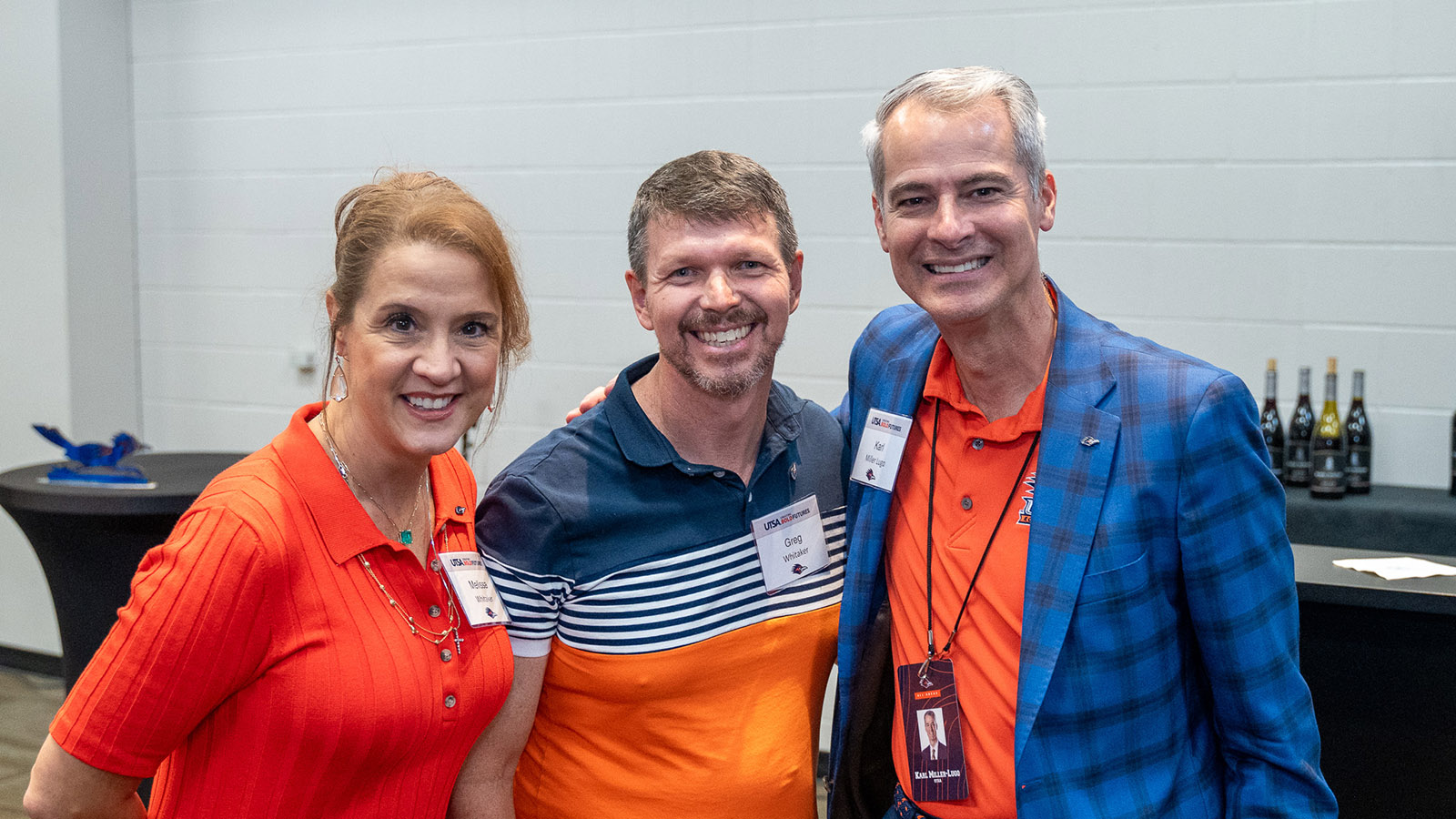 Karl Miller Lugo with Melissa and Greg Whitaker at Alamodome