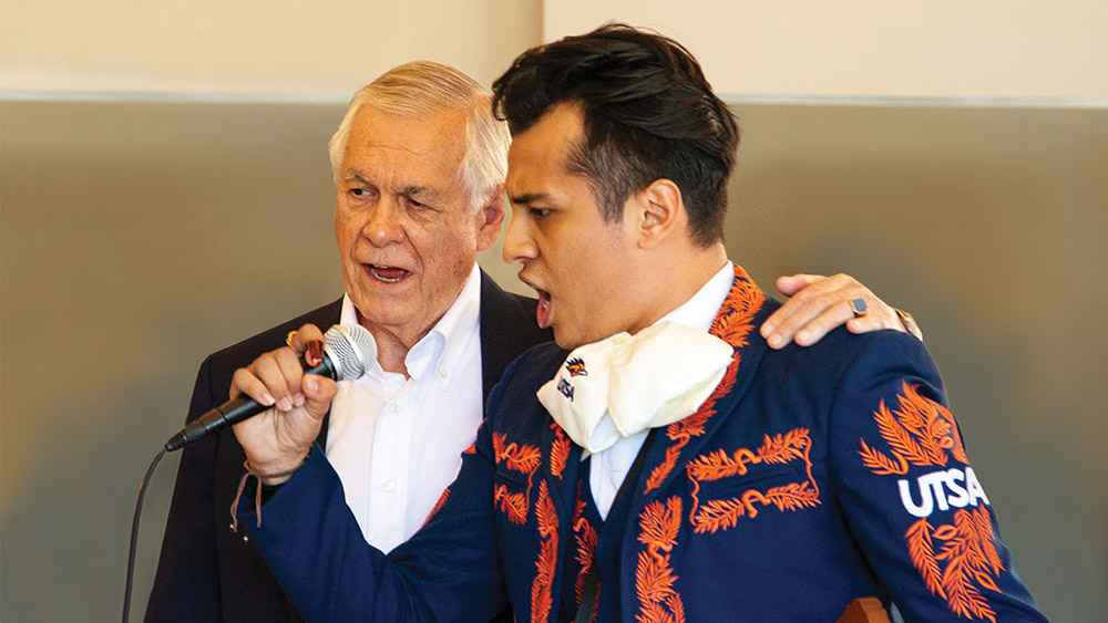 Carlos Alverez singing with a UTSA mariachi