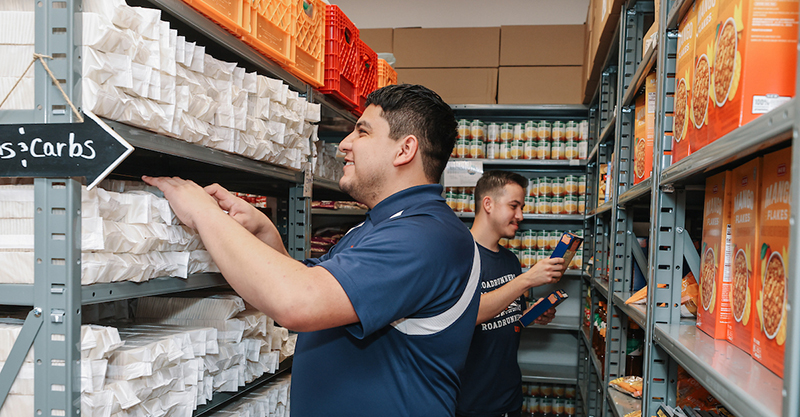 Students grabbing food in UT San Antonio Food Pantry