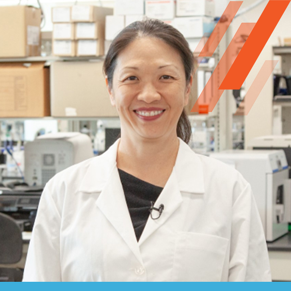 Jenny Hsieh smiling in science lab