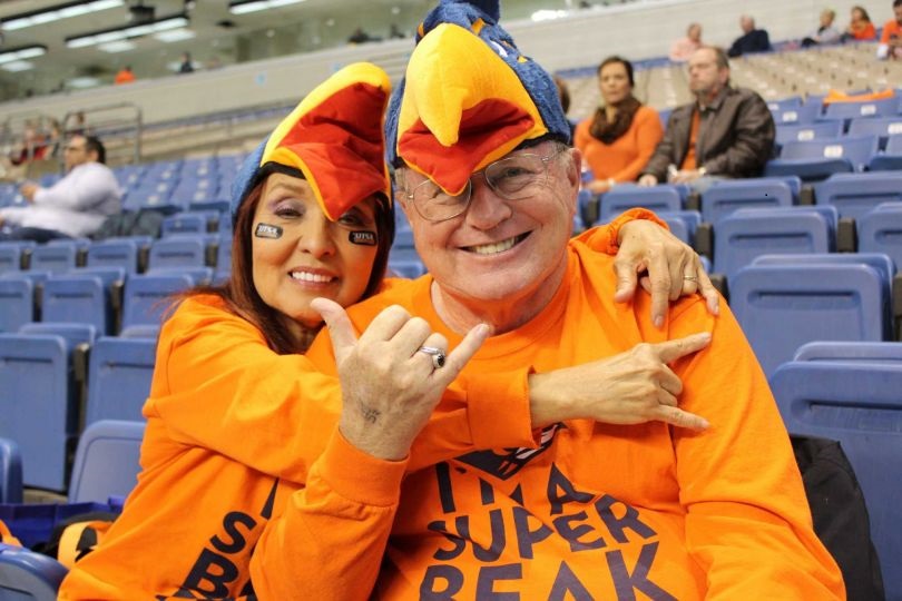 Mike and Gloria Anderson doing birds up at football game