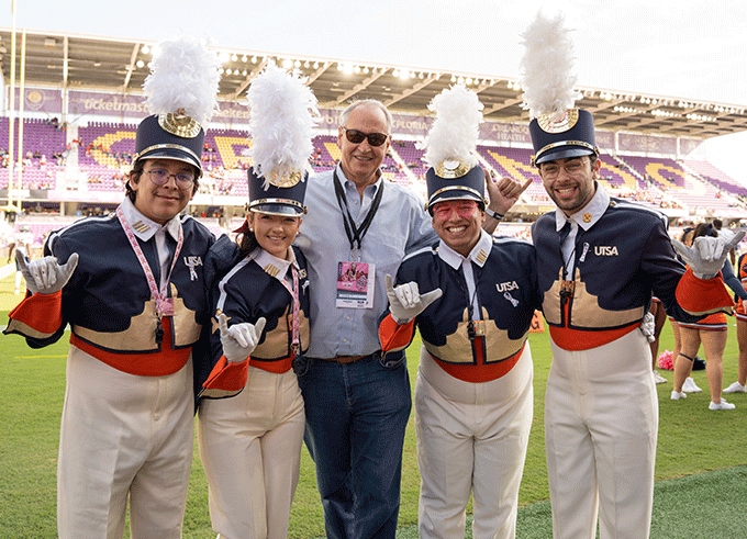 UTSA marching band with President Eighmy