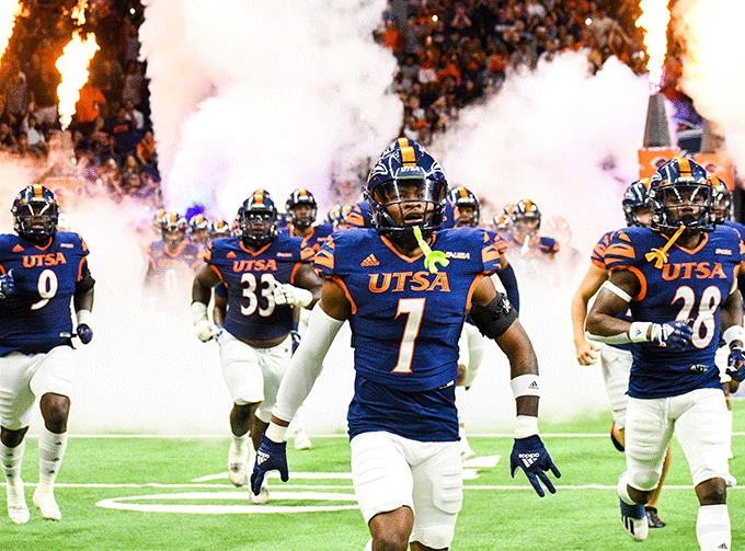 UTSA football running onto field at Alamodome