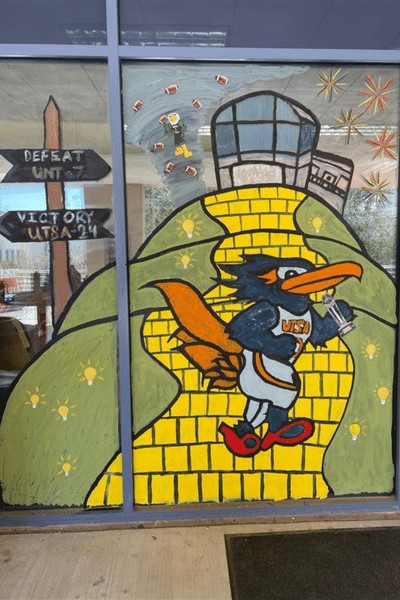 2022 Office Decorating Winner - classic Rowdy mascot along yellow brick road with union in background