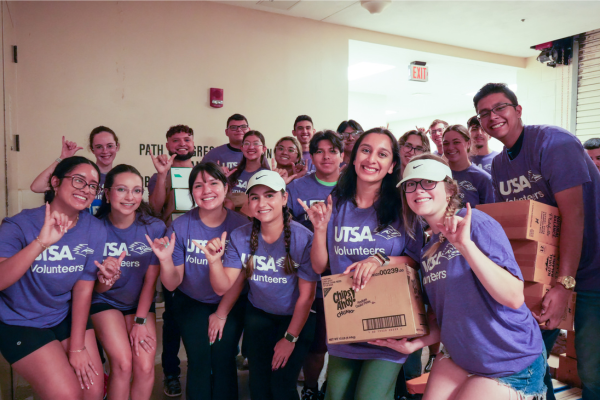Students posing for photo after a service event