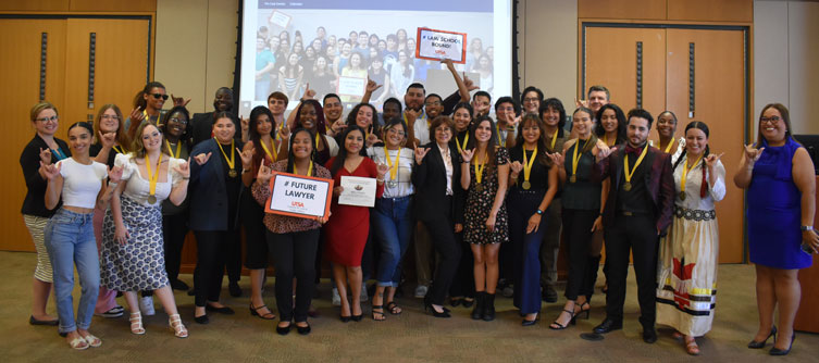 Group photo with sign of Law School Bound