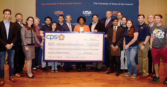 Paula Gold-Williams (center), president and chief executive officer of CPS Energy, presented a check to TSERI and the CPS Energy Strategic Alliance during the Equinox Festival held on UTSA Main Campus fall 2017.