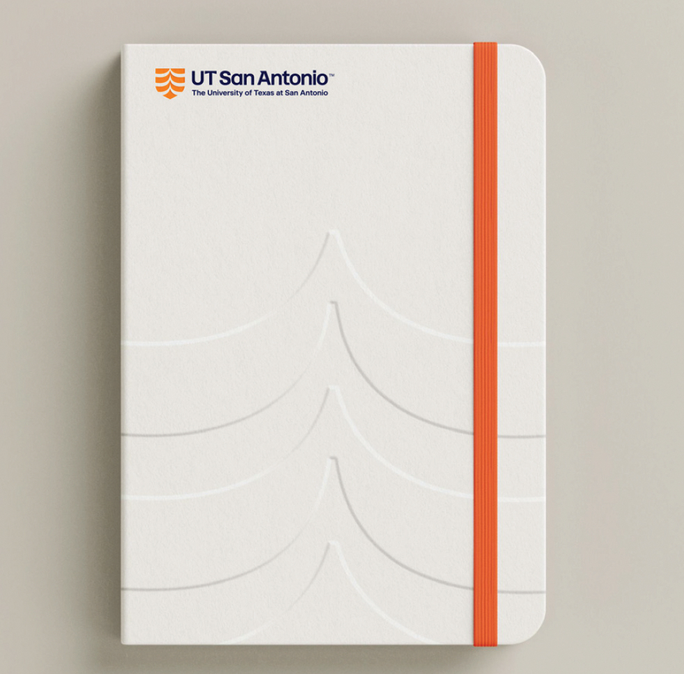 White notebook with branding