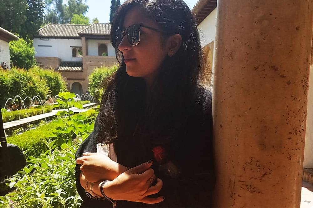 Nishita Maliek ’17, a UTSA criminal justice graduate student at the time, visits the central courtyard garden of the Alhambra, a palace and fortress in Granada, Spain, originally build in 889 but built over and added to in subsequent centuries.